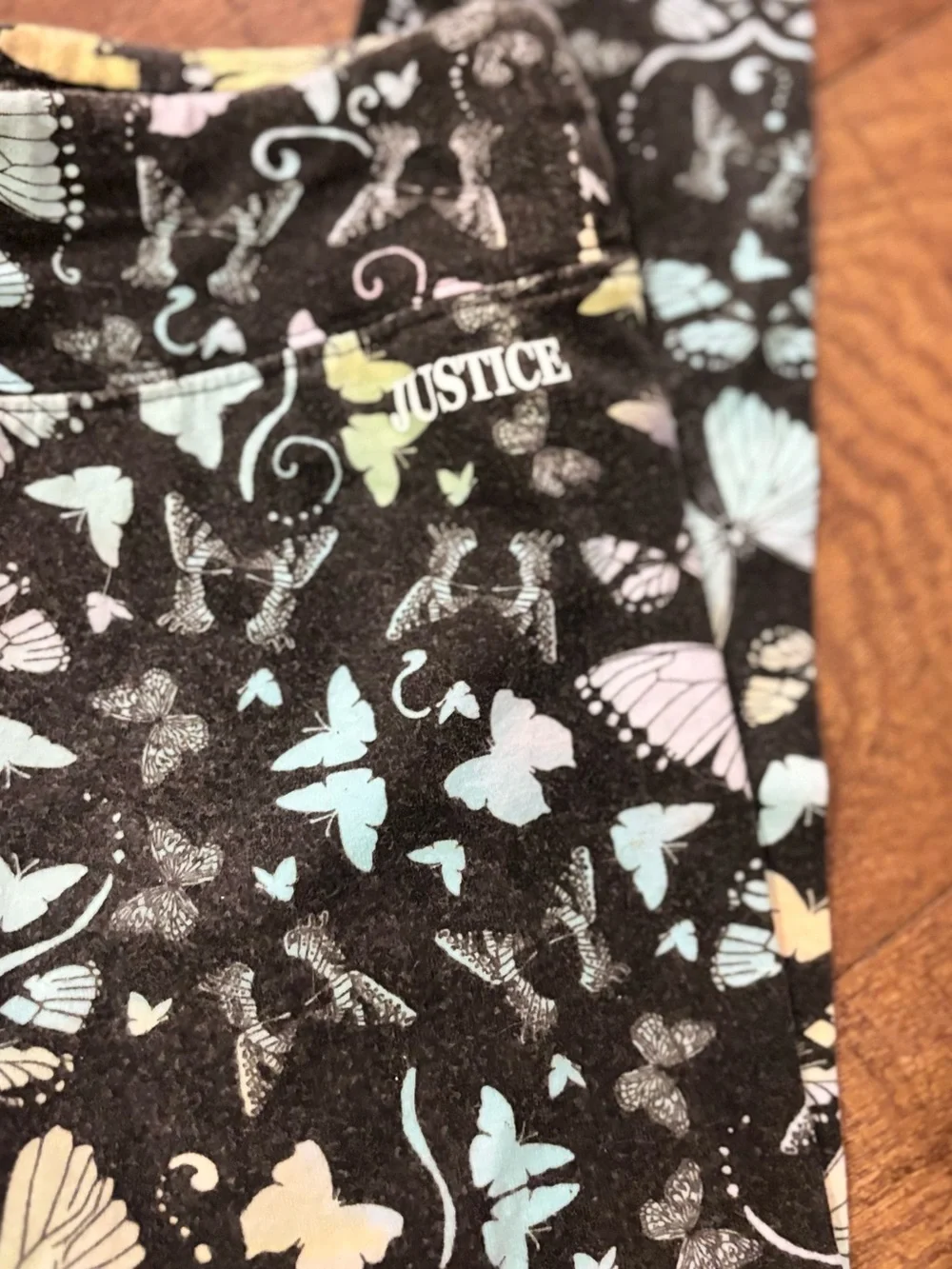 Justice Black Leggings with Pastel Butterfly Accents
